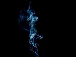 white smoke,  abstract on black background photo