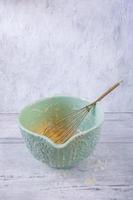 Ingredients for baking a cake with egg yolks in a bright bowl photo