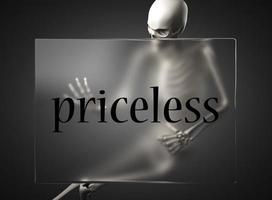 priceless word on glass and skeleton photo