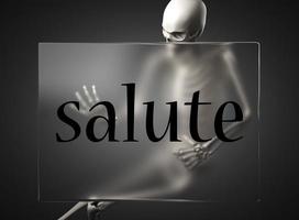 salute word on glass and skeleton photo