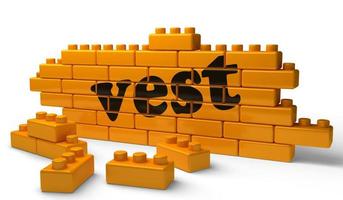 vest word on yellow brick wall photo