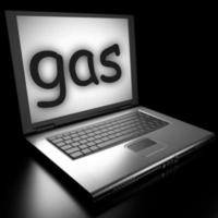 palabra de gas en la computadora portátil foto