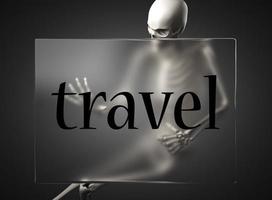 travel word on glass and skeleton photo