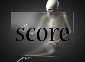 score word on glass and skeleton photo