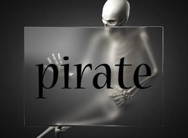 palabra pirata en vidrio y esqueleto foto