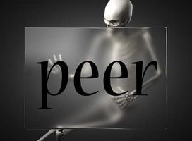 peer word on glass and skeleton photo