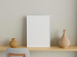 Modern and minimalist vertical white poster or photo frame mockup on the wall in the living room. 3d rendering.