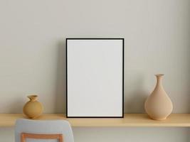 Modern and minimalist vertical black poster or photo frame mockup on the wall in the living room. 3d rendering.