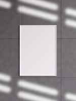Modern and minimalist vertical white poster or photo frame mockup on the concrete wall in a room. 3d rendering.