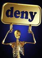 deny word and golden skeleton photo