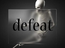 defeat word on glass and skeleton photo