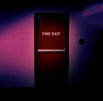 Fire exit door. Fire exit emergency door red color metal material photo