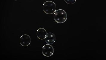 Soap bubble drop or Shampoo bubbles floating like flying in the air photo