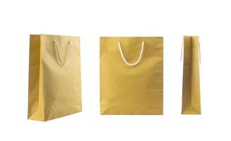 Brown folded paper bag with handles isolated on white background photo