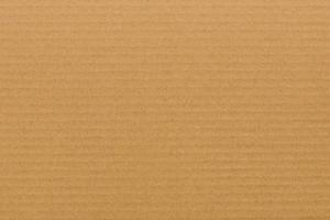 brown paper corrugated sheet board surface photo