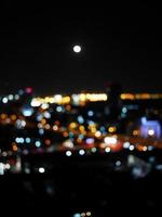 Defocused blur lights of night scape photo