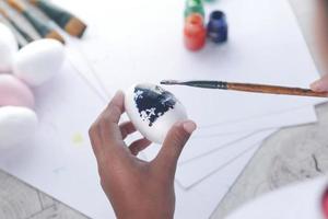 painting on a white color egg photo