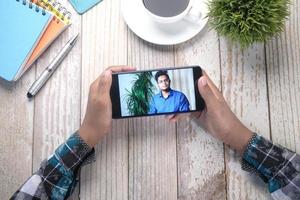 businessman working in video conference, close up. photo