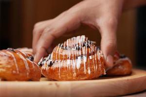 close up cinnamon danish roll on table photo