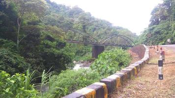 railroad track over the river. Padang Panjang City photo