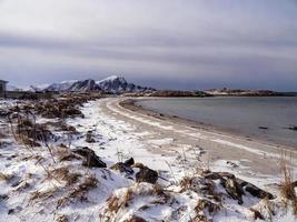Beach at Andenes in Vesteralen, Norway, with snow