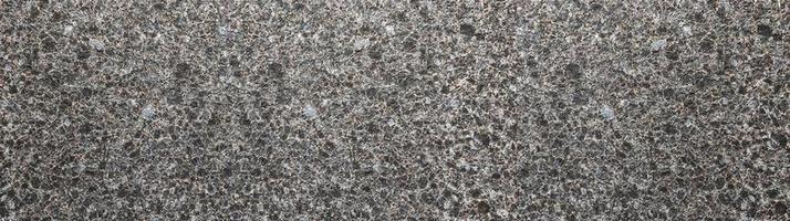 Panoramic concrete wall background. rock abstract wall background photo