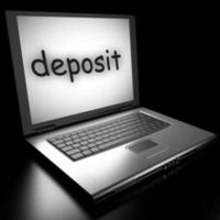 deposit word on laptop photo