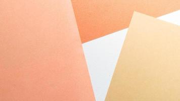 Different shades of orange paper background