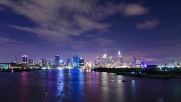 Night time illumination traffic river luxury hotel bay rooftop panorama 4k timelapse. video