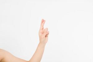 hand symbol. Finger crossed hand sign, good luck symbol isolated on white. Mock up. Copy space. Template. Blank. photo