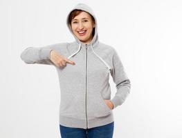 happy pointed woman in gray pullover hoodie mockup photo