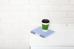 Workplace and education accessories on white table. Selective focus and copy space photo