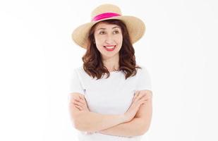 Anti wrinkle aging summer face skin protection. Middle age woman in beach hat and makeup in white template t shirt isolated. Holiday and vacation concept. Copy space background. Banner photo