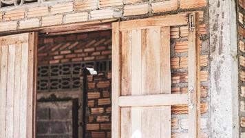 Window of an old abandoned house. Scary. Scary place concept. photo