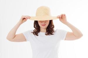 Summer beach holiday, vacation concept. Woman in hat and template blank t shirt isolated on white background. Copy space on tshirt and place for print. Sun skin care, wrinkles protection. Anti aging photo