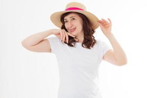 Summer beach holiday, vacation concept. Woman in hat and template blank t shirt isolated on white background. Copy space on tshirt and place for print. Sun skin care, wrinkles protection. Anti aging photo