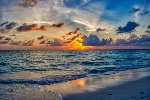 Beautiful sunset on the tropical sea beach background for travel in holiday relax time