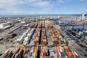 Navegantes, Santa Catarina, Brazil, MAR 2022 -Aerial view of APM Terminals Navegantes and its urban surroundings photo