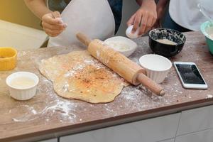 Children preparing lunch in the kitchen. photo