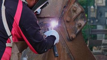 Worker cutting steel with a gas torch. Man cutting steel with propane and oxygen. Processes that use fuel gases and oxygen to weld and cut metals. video