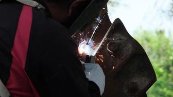 Worker cutting steel with a gas torch. Man cutting steel with propane and oxygen. Processes that use fuel gases and oxygen to weld and cut metals. video