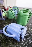 Plastic watering cans photo