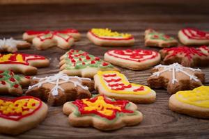 Christmas cookies on brown wooden table. Top view and mock up. photo