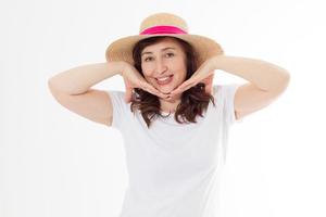 Summer beach holiday, vacation concept. Woman in hat and template blank t shirt isolated on white background. Copy space on tshirt and place for print. Sun skin care, wrinkles protection. Anti aging photo