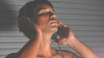 Asian men listening to music in relaxation photo