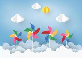 Paper Art  Design with Cloud and pinwheel  on light Blue background . the Concept is freedom or positive thinking ,vector design element illustration
