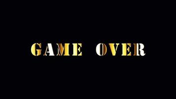 GAME OVER golden text with light glowing effect video