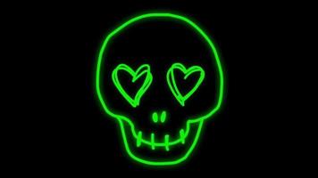 animatie groene neon licht schedel vorm op zwarte achtergrond. video