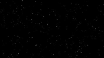 Video background of the night sky, with white particles falling down like snowfall. Night time.