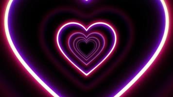 Animation red neon light hearts shape floating isolate for Valentine's day background. video